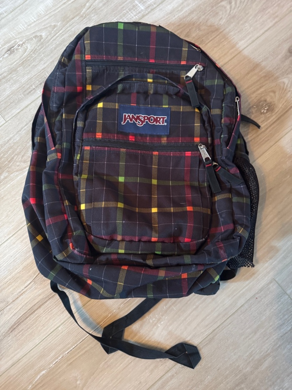 Jansport Black Plaid Backpack with Red, Yellow & Green Accents